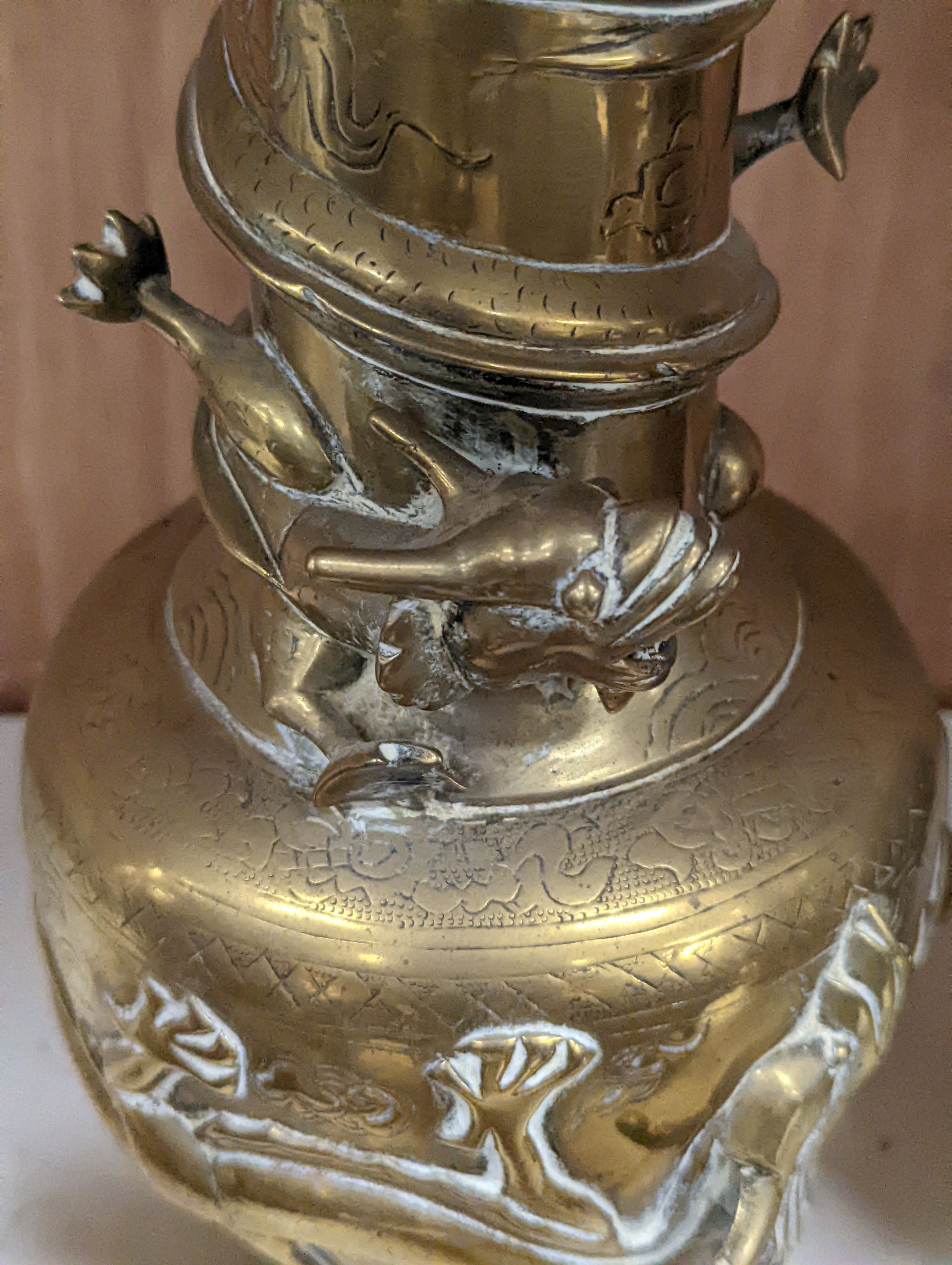 A pair of Chinese brass dragon vases, 26cm, together with two similar incense burners, tallest 30cm high